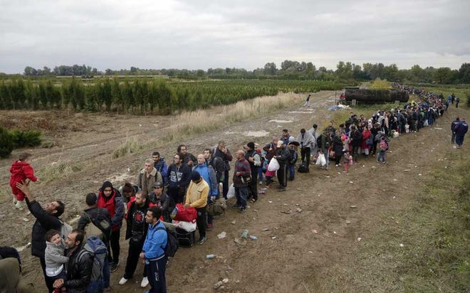 Petr David Josek Associated Press A group of migrants line up after crossing a border from Croatia near the village of Zakany, Hungary. Conciliation replaced confrontation among European nations that have clashed over their response to a wave of migration.