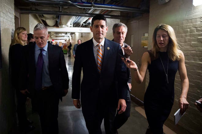 Rep. Paul Ryan, R-Wis., center, and Rep. Trey Gowdy, R-S.C., arrive for a House GOP meeting on Capitol Hill in Washington, Friday, Oct. 9, 2015. The pressure is on Ryan to run for House speaker in the chaotic aftermath of Majority Leader Kevin McCarthy's sudden decision to abandon his campaign for the post. (Doug Mills/ The New York Times via AP)