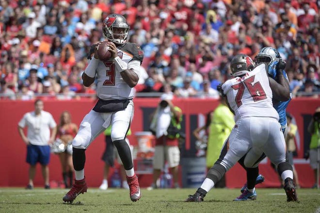 Tampa Bay Buccaneers quarterback Jameis Winston (3) drops back to pass as offensive tackle Donovan Smith (76) provides the block during the first half against Carolina last week. Winston threw four interceptions in the Bucs' loss. (AP Photo/Phelan M. Ebenhack)