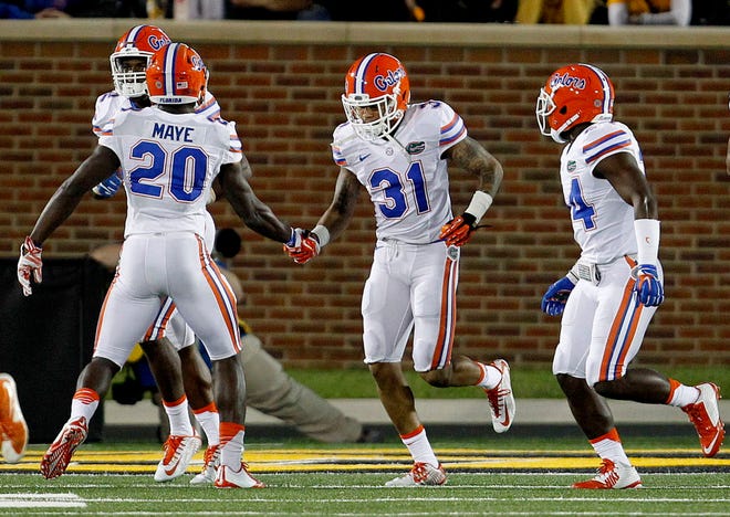 Florida Gators defensive back Jalen Tabor (31) and defensive back Marcus Maye (20) celebrate after Tabor returned an interception for a touchdown during the second half at Faurot Field on Saturday, Oct. 10, 2015 in Columbia, Mo. Florida defeated Missouri 21-3. Matt Stamey/Staff photographer