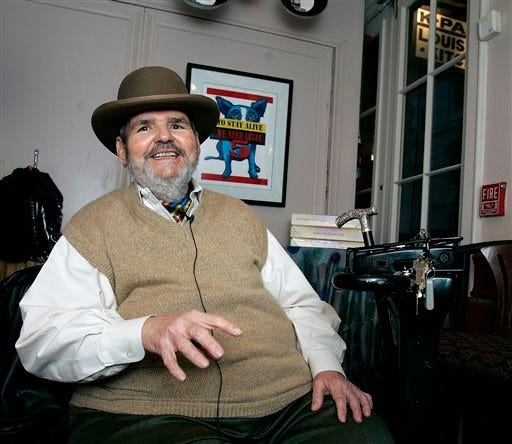 FILE -In this Friday, Feb. 2, 2007 file photo, chef Paul Prudhomme gestures during an interview at his French Quarter restaurant, K-Paul's Louisiana Kitchen, in New Orleans. Prudhomme, the Cajun who popularized spicy Louisiana cuisine and became one of the first American restaurant chefs to achieve worldwide fame, died Thursday, Oct. 7, 2015. He was 75.
