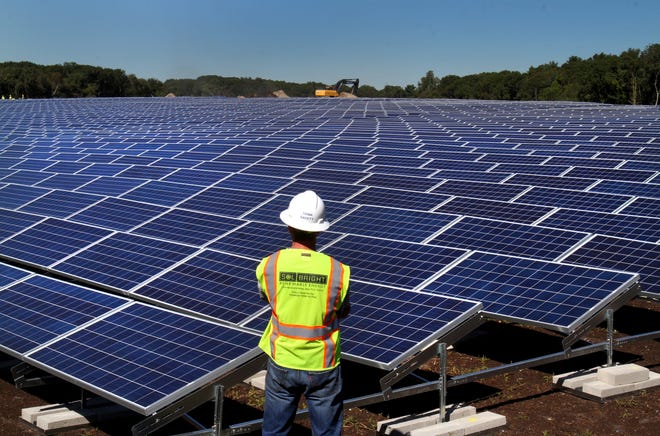 This solar array on a closed landfill in East Providence generates about 3.7 megawatts of electricity, far less than the 10 megawatts that would be generated by the solar farm proposed for Western Cranston. The Providence Journal/Bob Thayer