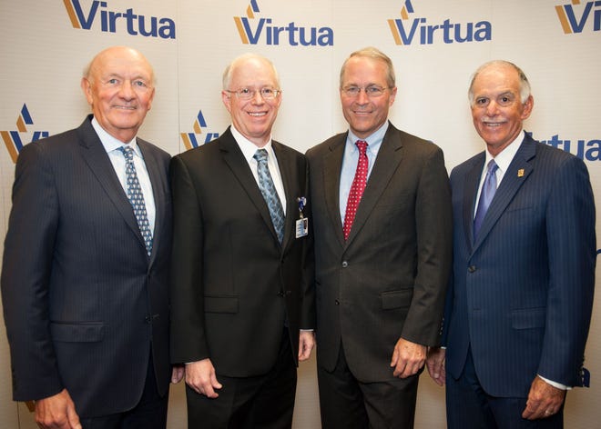 Leaders from Virtua and Penn Medicine on Tuesday, Oct. 13, 2015, at Virtua Hospital in Voorhees, announce a strategic alliance for cancer and neurosciences care. Pictured (from left) are Ralph W. Muller, CEO of the University of Pennsylvania Health System; Dr. Jonathan Orwitz, medical director of neurology at Virtua; Dr. Sean Grady, chairman, Department of Neurosurgery at Penn Medicine; and Richard P. Miller, president and CEO of Virtua.