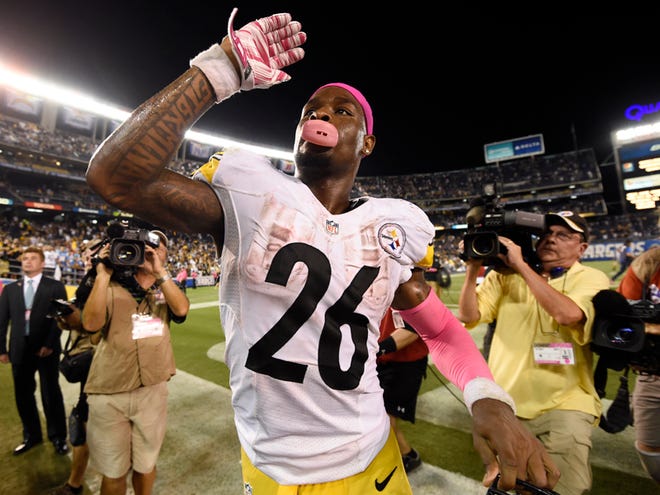 Pittsburgh Steelers running back Le'Veon Bell reacts to fans as he celebrates defeating the San Diego Chargers in an NFL football game Monday, Oct. 12, 2015, in San Diego. The Steelers won, 24-20.