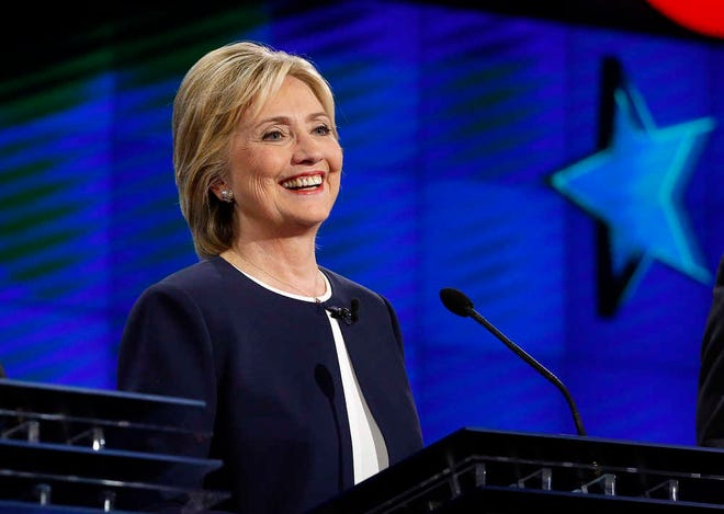 Hillary Rodham Clinton smiles during the CNN Democratic presidential debate Tuesday, Oct. 13, 2015, in Las Vegas. (AP Photo/John Locher)