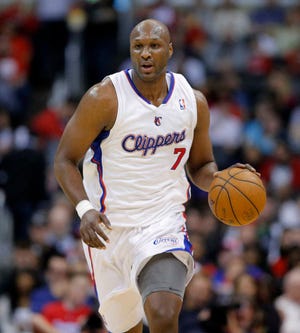 Lamar Odom, the former NBA star and reality TV personality embraced by teammates and fans alike for his humble approach to fame, was hospitalized and his estranged wife Khloe Kardashian is by his side, after being found unresponsive in a Nevada brothel where he had been staying for days. (AP Photo/Jae C. Hong)