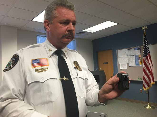 Kings Mountain Police Chief Melvin Proctor holds one of the possible choices for KMPD's new body camera.