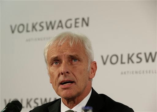 In this Sept. 25, 2015 photo newly appointed Volkswagen CEO Matthias Mueller speaks during a press statement after a meeting of Volkswagen's supervisory board in Wolfsburg, Germany. Germany's motor transport agency is ordering a mandatory recall of Volkswagen cars sold with software that enabled them to evade diesel emissions testing, as it was announced Thursday, Oct. 15, 2015. Mueller has said a recall could start in January and be completed by the end of next year in Germany. (AP Photo/Michael Sohn)