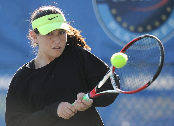 Moorestown's No. 1 singles Emily O'Neil hits a return against Mainland's Meena Mandalapu during the Group 3 state semifinal match at Mercer County Park in West Windsor Township, New Jersey on Thursday, October 15, 2015.