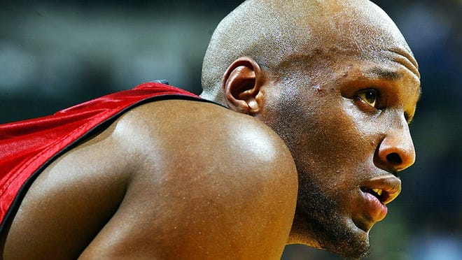 INDIANAPOLIS, IN - May 15: Lamar Odom #7 of the Miami Heat looks on during Game five of the Eastern Conference Semifinals of the 2004 NBA Playoffs against the Indiana Pacers at Conseco Fieldhouse on May 15, 2004 in Indianapolis, Indiana. NOTE TO USER: User expressly acknowledges and agrees that, by downloading and or using this photograph, User is consenting to the terms and conditions os the Getty Images License Agreement. (Photo by Andy Lyons/Getty Images)