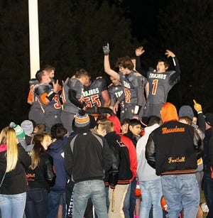 Sturgis players celebrate with fans after picking up a win over Plainwell Friday night.