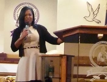 Danielle Gay, first lady of Higher Way Ministries in Petersburg, speaks to a standing room only audience during the church's two-day conference for women. Contributed Report