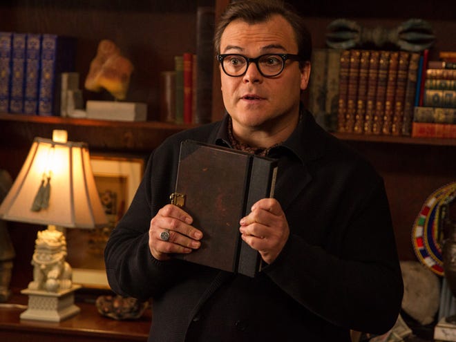In this photo provided by Columbia Pictures, Jack Black who stars as R.L. Stine, Slappy, and Invisible Boy, appears in a scene in Columbia Pictures' "Goosebumps."
