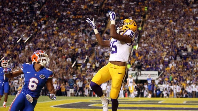Malachi Dupre #15 of the LSU Tigers catches a touchdown over Quincy Wilson #6 of the Florida Gators at Tiger Stadium on October 17, 2015 in Baton Rouge, Louisiana. (Photo by Chris Graythen/Getty Images)