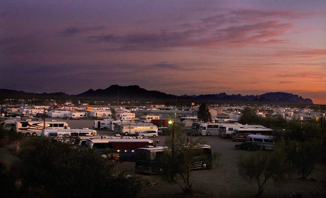 QUARTZSITE, AZ., JANAURY 24, 2011: The sun sets over one of the many RV parks adjacent to the I-10 freeway in Quartzsite January 24, 2011. Every year there is a snowbird migration to Quartzsite, Arizona that increases the population from over 3,000 to close to 500,000. The warm sunny climate draws the people who are seeking deals at rock shows, pow-wows, and RV swap meets (Mark Boster/Los Angeles Times).