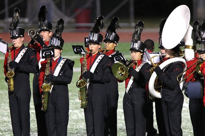 Milton High School's marching band performs at the homecoming football game on Friday, Oct. 16, 2015.