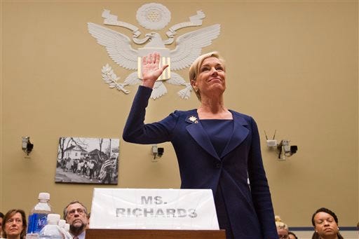 In this Tuesday, Sept. 29, 2015 photo, Planned Parenthood Federation of America President Cecile Richards is sworn in before testifying at a House Committee on Oversight and Government Reform Hearing on "Planned Parenthood's Taxpayer Funding," in Washington. Responding to a furor over undercover videos, Planned Parenthood said Tuesday, Oct. 13, 2015 it will maintain programs at some of its clinics that make fetal tissue available for research, but will no longer accept any sort of payment to cover the costs of those programs. (AP Photo/Jacquelyn Martin)
