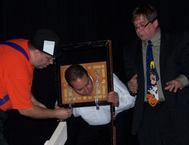 Despite being handcuffed, magician Mark Joseph managed to escape from a headlock during the 2014 “Sharing the Magic” benefit. This year’s show is set for Saturday, and benefits the Colon Food Pantry.
