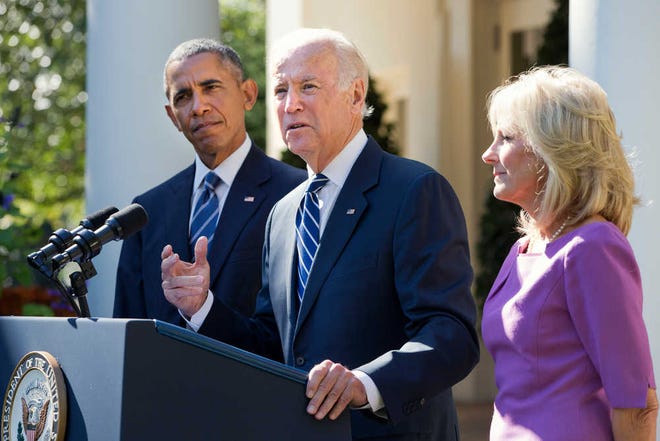 Vice President Joe Biden, with his wife Dr. Jill Biden, right, and President Barack Obama announces that he will not run for the presidential nomination, Wednesday, Oct. 21, 2015, in the Rose Garden of the White House in Washington. (AP Photo/Jacquelyn Martin)