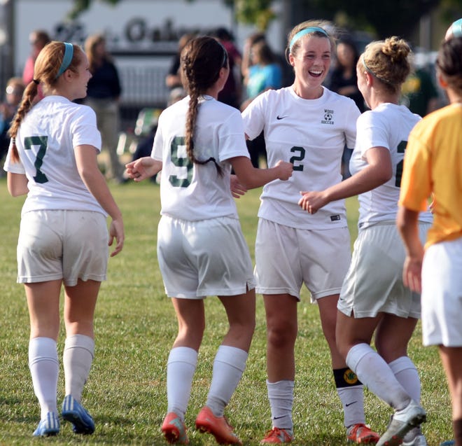 Wood’s Kylie Menarde is all smiles after scoring a goal Thursday, October 22, 2015, in a Philadelphia Catholic League girls soccer quarterfinal game with St. Hubert. The Vikings won 2-0.