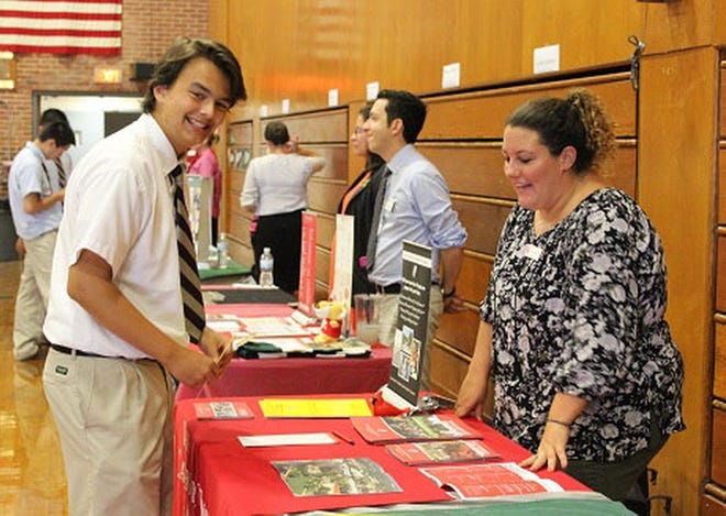 Stang senior Nicholas Viveiros gathers information from a local college. SUBMITTED