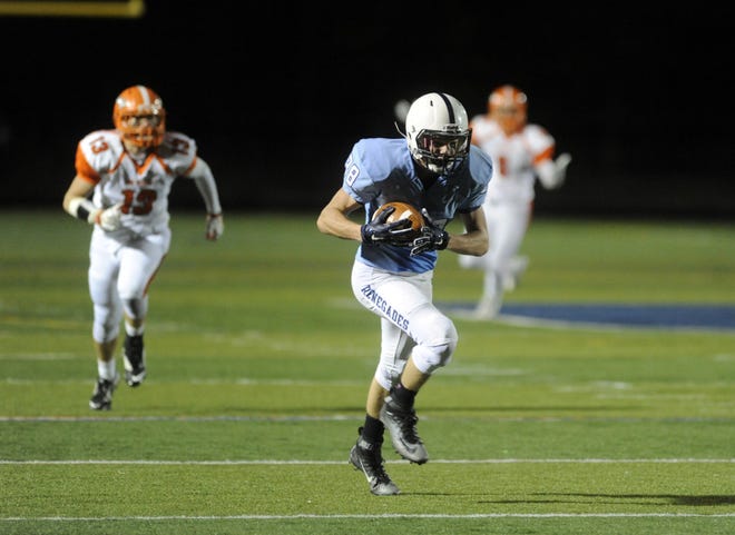 Adam Nolan of Shawnee outruns the Cherokee defense for a touchdown in the third quarter of the Renegades' 35-14 win Friday night.