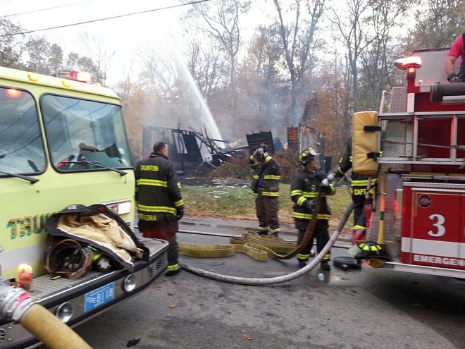 Taunton firefighters and police respond to a house explosion at 40 Christine Lane on Sunday afternoon.
