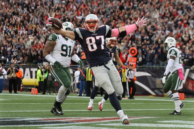 Rob Gronkowski heads into the end zone with a fourth-quarter touchdown.