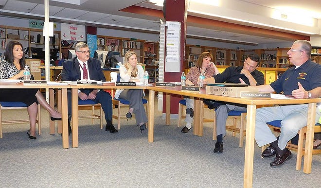 Shown during last week's Frankfort-Schuyler school board meeting are, from left, board President Lisa LoRe, Superintendent Robert Reina, Business Administrator Kacey Sheppard-Thibault and board members Angela Service, Jack Bono and Charles Conigliaro. TIMES TELEGRAM PHOTO/DONNA THOMPSON