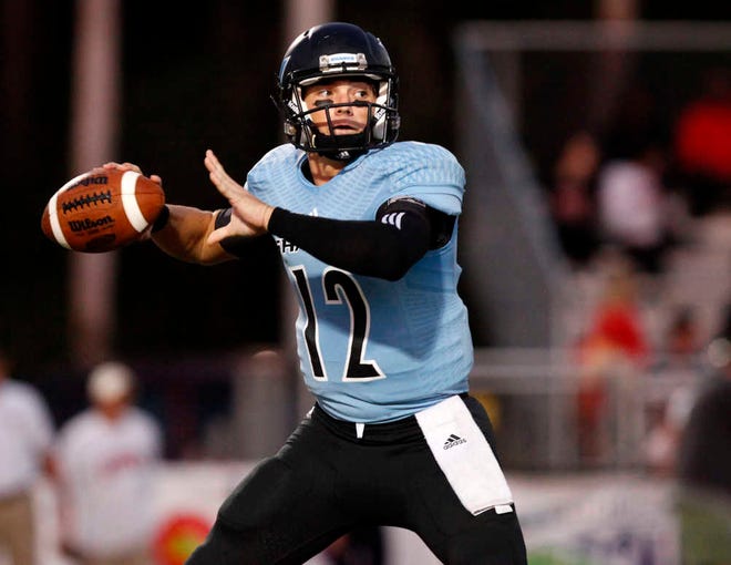 DARON.DEAN@STAUGUSTINE.COM Ponte Vedra quarterback Nick Tronti drops back for a pass during high school football action against Bishop Kenny at Ponte Vedra on Friday night, October 16, 2015.
