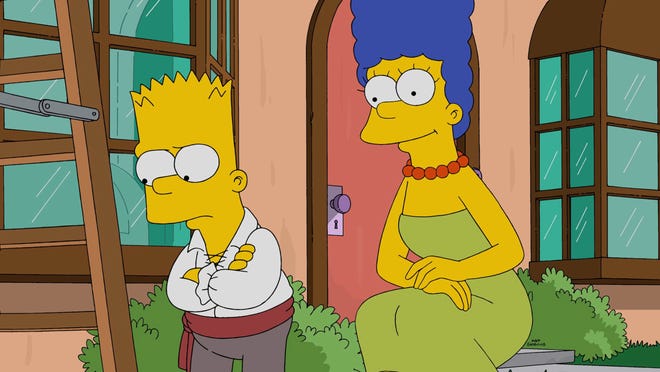 Marge, right, promises to make Halloween fun for Bart, left, in the all-new "Halloween Horrorî episode of "The Simpsons," that aired Oct. 18, on FOX. The Associated Press