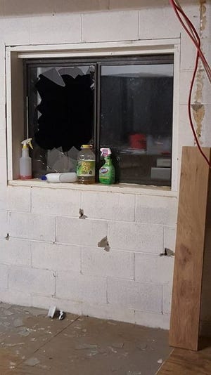 The pressbox window facing the minor league field was broken out and well as damage to the door locks.