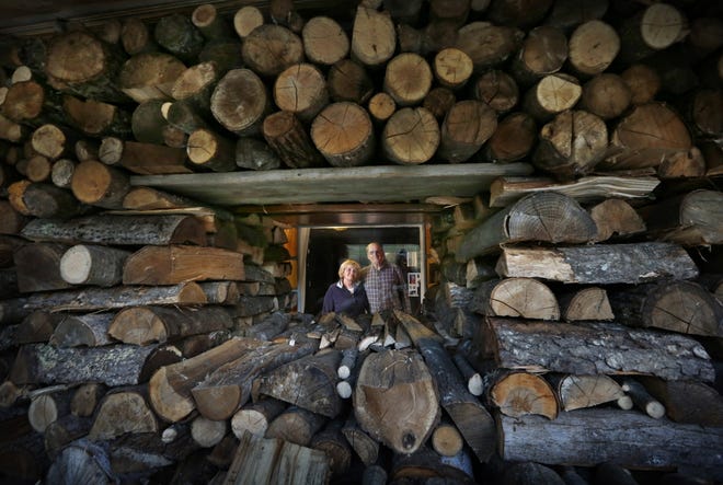 Terri and Bob Tomchak, of Bridgton, Maine, burn about four cords of firewood each winter. Cordwood prices have been increasing. AP Photo/Robert F. Bukaty