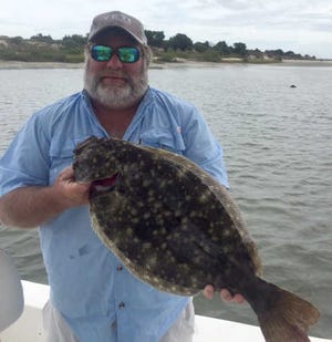 Captain Scott Shank of Full House Fishing Charters with a flounder that tipped the scales at over 9 pounds. It was caught last week on the South Jetties at St. Augustine Inlet. Contributed