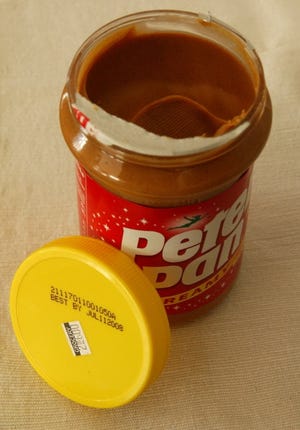 Peanut butter jars are among those that frustrate consumers' attempts to get every dab.

STEVE HEASLIP/CAPE COD TIMES FILE