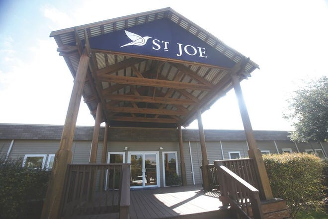 Watersound-based St. Joe Co. has reached a settlement with the U.S. government over charges related to financial results from 2009, 2010 and prior periods.