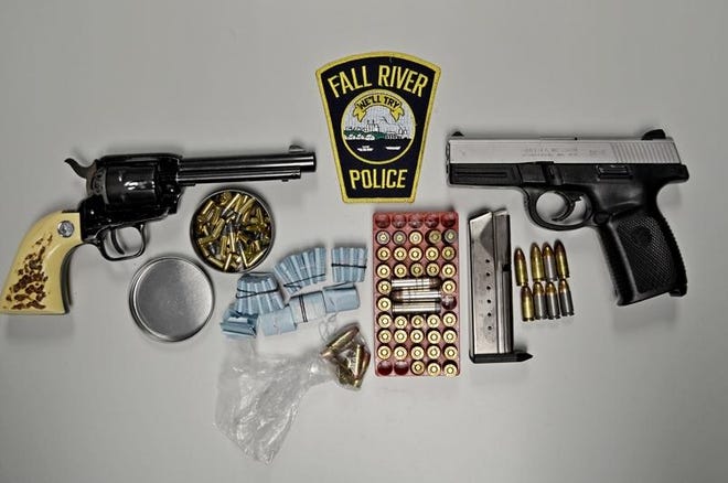 Fall River police located guns, ammunition and heroin following a shots fired call early Friday morning.
