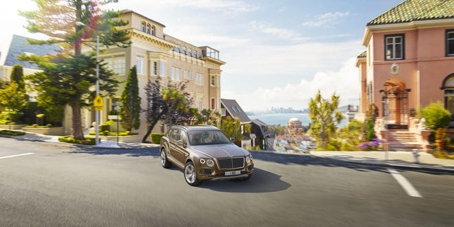 The Bentayga SUV has a profile similar to the Audi Q7, but bolder, brawnier and unmistakably Bentley.