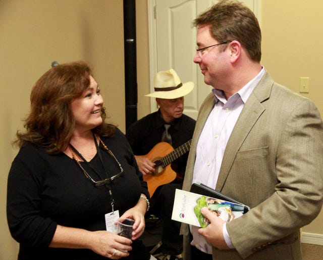 Jamie Mitchell • Times Record Melody Mortson with Methodist Counseling Clinic in Alma and Rev. Daniel Thueson, Alma and Kibler United Methodist Church Pastor, spend a few minutes talking about the clinic services, Thursday, Oct 29, 2015, during the Methodist Counseling Clinic's open house at 1209 Hwy 71 N., Suite B. The clinic is part of Methodist Family Health, offering outpatient programs that include individual, group and family counseling services as well as psychological testing, psychaiatric assessments, medication management and other therapeutic services.