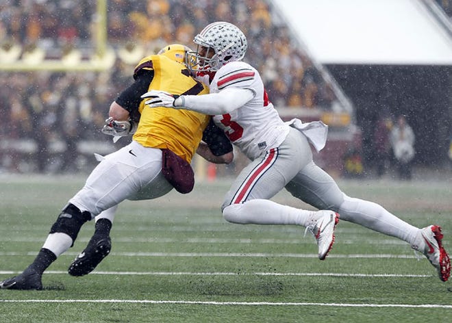 It was 15 degrees and snowing last year in Minnesota when Ohio State linebacker Darron Lee took down Gopher quarterback Mitch Leidner. Temperatures are expected to be about 40 degress warmer on Saturday night.