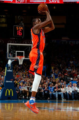 Oklahoma City's Kevin Durant (35) shoots during the NBA game between the Oklahoma City Thunder and the Denver Nuggets at the Chesapeake Energy Arena , Sunday, Nov. 1, 2015. Photo by Sarah Phipps, The Oklahoman