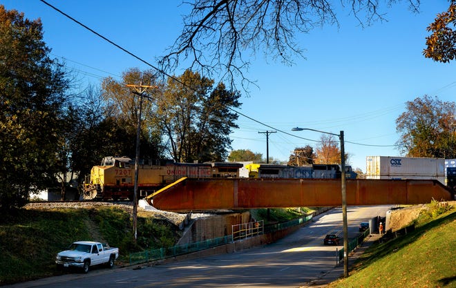 Union Pacific locomotive 7207 pulls a freight train over the new bridge above Ninth Street Monday, Nov. 2, 2015. The new 185-foot span contains about 1 million pounds of structural steel and replaced three spans in the old bridge totaling 108 feet. The new bridge also allowed for removal of three piers, including the center pier that divided Ninth Street traffic. Ted Schurter/The State Journal-Register