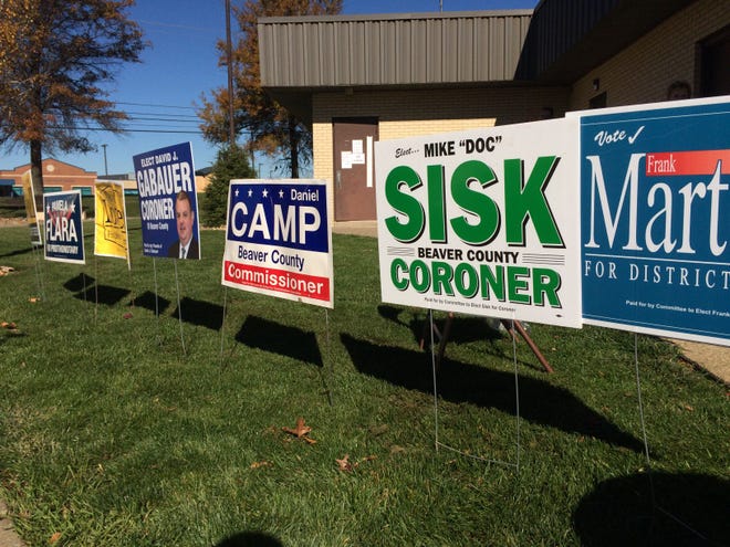 Signs were placed in front of the Center Township Municipal Building, where a polling station, candidates and campaign helpers were also stationed Tuesday for the general election.