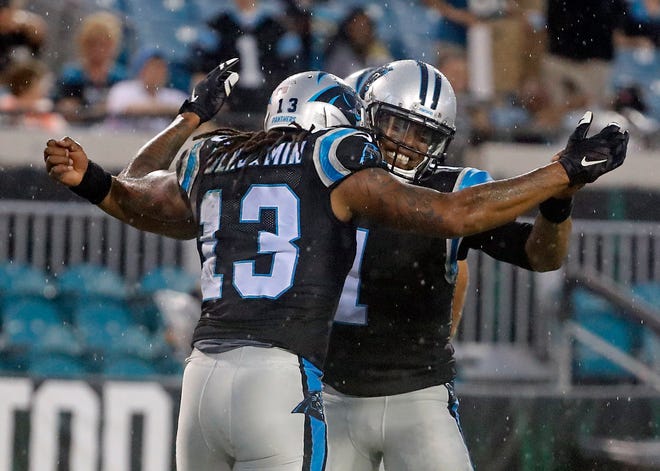 Carolina Panthers' Cam Newton (1) celebrates a Panthers touchdown against the Indianapolis Colts in the first half of an NFL football game in Charlotte, N.C., Monday, Nov. 2, 2015. (AP Photo/Mike McCarn)