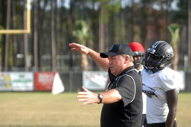 Jack Cavanaugh/Bluffton Today Coach Ken Cribb gives instruction during a drill on Monday.