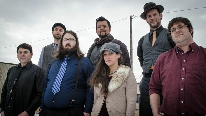 Cowgirl’s Train Set is a Lawrence-based group that blends a variety of American music styles. Its members are (front row, from left) Chris Valencia, Chad Buck, Erin Parr, Jeff Williams, (top row, from left) Al Moews, Mike Calvillo and Hank Osterhout.