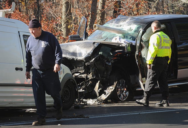 The driver of a van, at left, was killed Wednesday morning in a head-on collision with a pickup truck on Route 122 in Paxton. A pipe pierced the pickup's windshield in the accident, just missing the driver. T&G Staff/Rick Cinclair