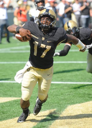 Army quarterback Ahmad Bradshaw, here celebrating his touchdown against Wake Forest in September, is back from injuries to start at Air Force on Saturday. THE ASSOCIATED PRESS