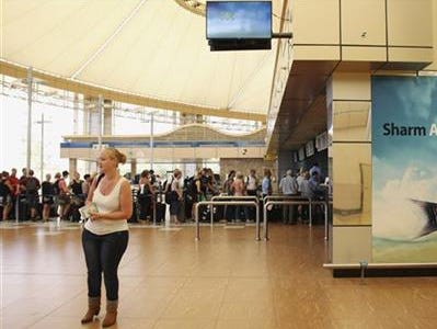 Tourists wait in the departure hall to be evacuated from Sharm el-Sheikh airport, south Sinai, Egypt, Friday, Nov. 6, 2015. Egyptian police carried out detailed security checks on Friday at the airport in Sharm el-Sheikh, the resort from where the doomed Russian plane took off last weekend, after U.K. officials confirmed that flights will start bringing stranded British tourists home from the Sinai Peninsula.