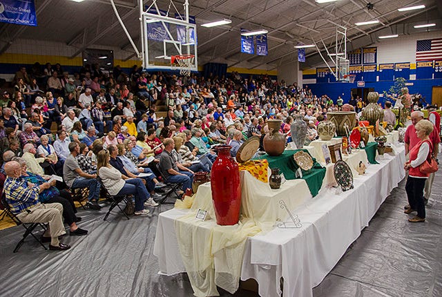 A good crowd was on hand for the Hospice Auction fundraiser held at Southwestern Randolph High School 11-7-15. (Paul Church/The Courier-Tribune)
